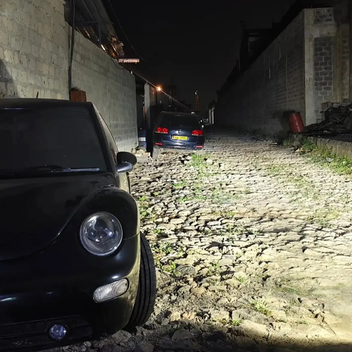 Projector beam on a dark road