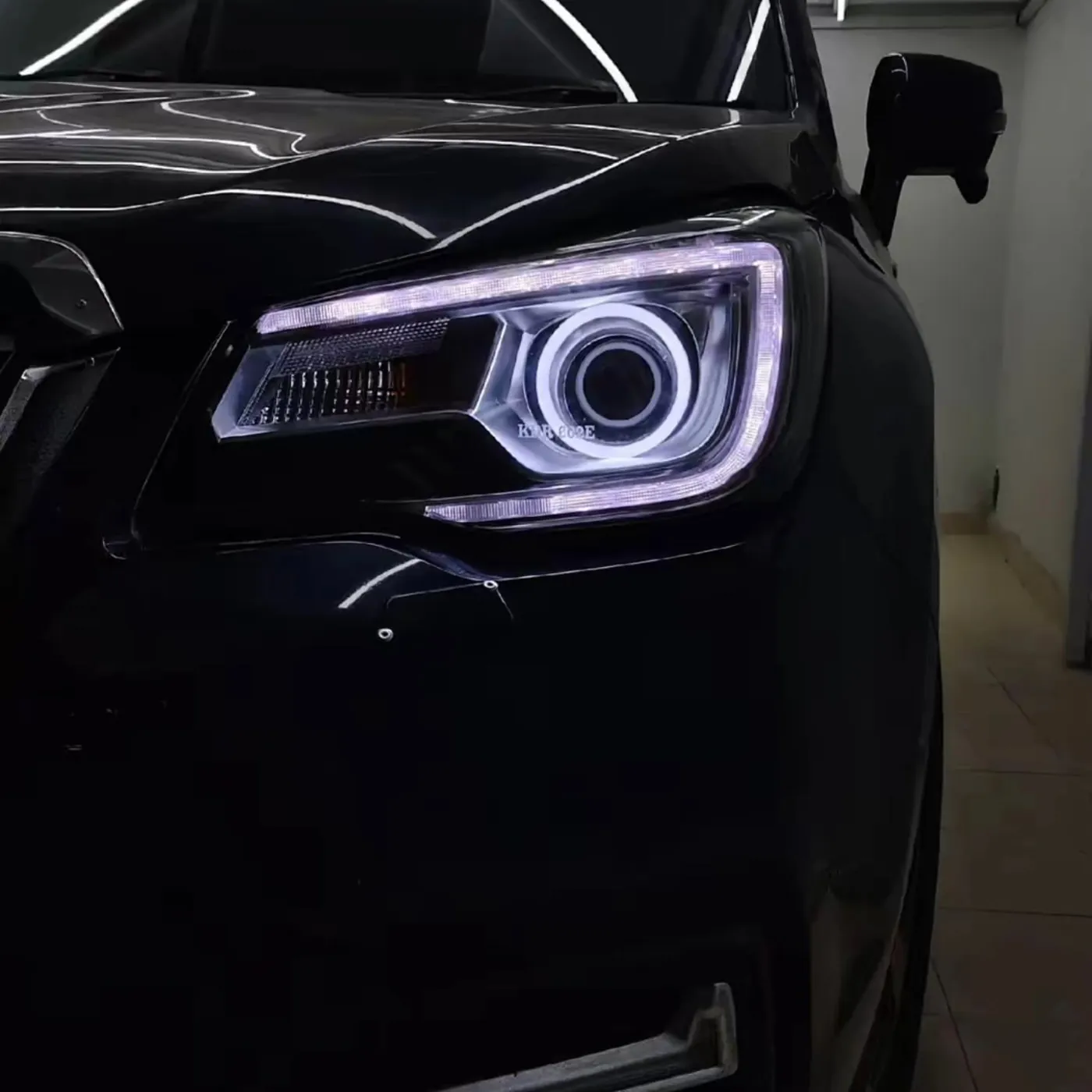 Forester headlight with ring and strip